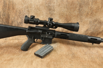 Bushmaster XM15-E2S 20" Semi-Auto Rifle .223 Rem Riton Optics&reg; 1 CONQUER 6-24x50mm Scope