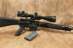 Bushmaster XM15-E2S 20" Semi-Auto Rifle .223 Rem Riton Optics&reg; 1 CONQUER 6-24x50mm Scope