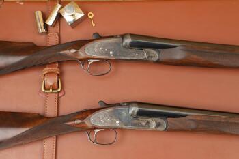 Cased Consecutive Pair F.E. Malin and Sons Tudor Rose 12 GA Sidelock Best Double Guns, 1982